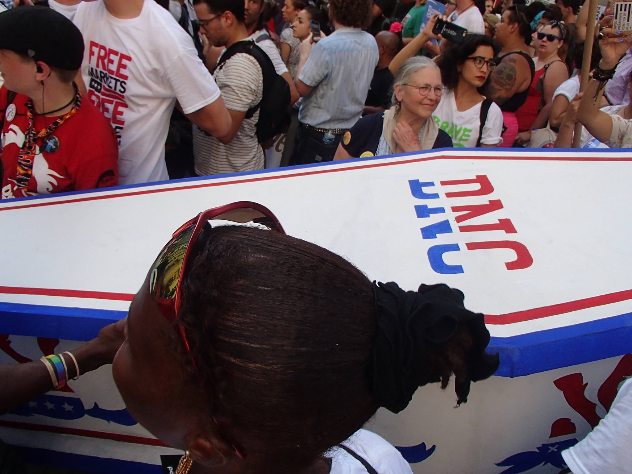 Protester carry the "dead on arrival" D.N.C. in a coffin. 