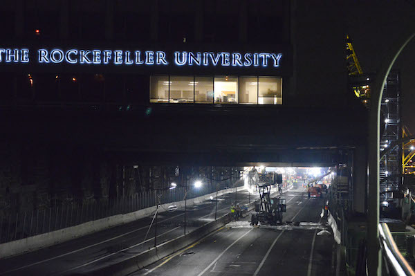 A view of Rockefeller University from the south, with the FDR Drive closed and crane operations going on in the lit area in the background. | JACKSON CHEN 