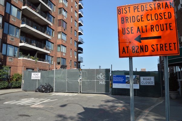 Though work continues on renovating the East 81st Street pedestrian bridge, the effort to incorporate an ADA-compliant ramp has been halted. | JACKSON CHEN 