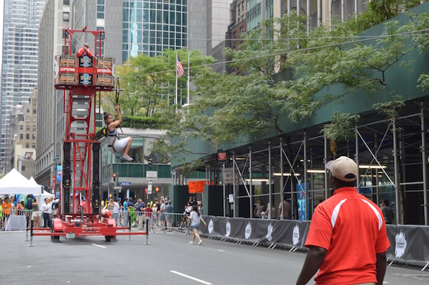 Imagine If Park Avenue Were One Big Summer Carnival 2 Zipline riders soared 30 feet high for 165 feet in a few moments of exhilaration. | JACKSON CHEN
