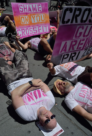 Crossfit Games Glock Give-Aways Spark Anti-Gun Anger 1 Demonstrators targeted the Crossfit Games in a protest that included a die-in. | DONNA ACETO
