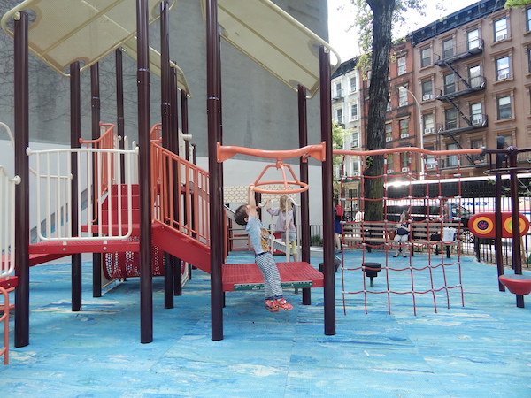 Renovations Revitalize Ramon Aponte Park 1 Ray Weaver and Indira O’Connell enjoy the new jungle gym. Photo by Jane Argodale.