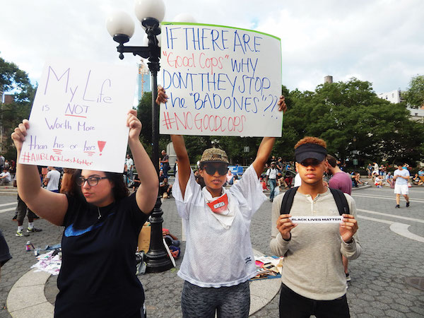 Black Lives Matter Protesters March Throughout the Weekend 7 Protesters created these signs in Union Square, on the evening of Sun., July 10. Photo by Jane Argodale.