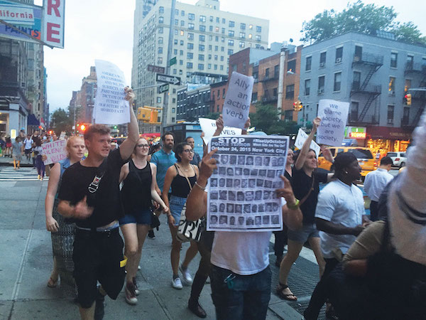 Black Lives Matter Protesters March Throughout the Weekend 2 Black Lives matter protestors marched up Seventh Ave. in Chelsea on Friday evening. Photo by Lauren Vespoli.