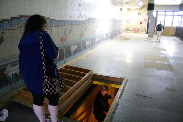 Nautical-themed mosaics line the long boarded-up pool, just one of many features unique to the building that may be preserved going forward. Photo by Yannic Rack.