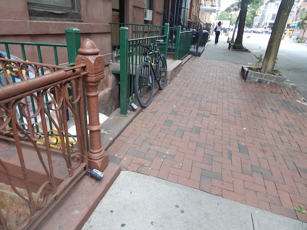 For the buildings at 309 and 311 W. 21st St., two lockboxes are placed at sidewalk level. Photo by Jane Argodale.