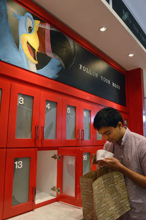You can be Toucan Sam: Ravi Rajendra follows his nose, to pick up his order from a red cupboard. Photo by Jackson Chen.