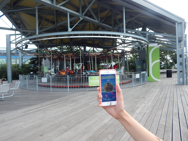 A PokéStop located at the Pier 62 carousel, in Hudson River Park. Photo by Tali Rose Rush.