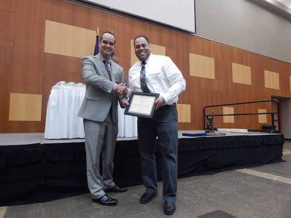 Cesar Soto, right, was one of 11 FIT officers awarded for five years of dedicated service. Photo by Jane Argodale.