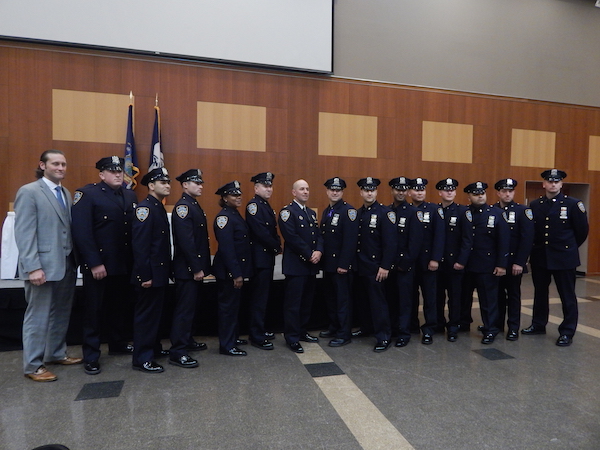 Awards Night Honors 10th Precinct’s Finest 1 Members of the 10th Precinct, after receiving honors at the June 29 ceremony. In the center is Captain Paul Lanot, their new Commanding Officer. Photo by Jane Argodale.