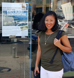 Take Back NYC spokesperson Kirsten Theodos in front of TD Bank at Bowery & Canal. Photo by David Mulkins.