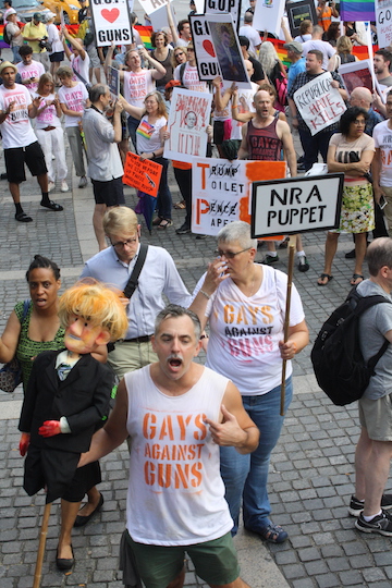 Guns, Platform Draw Gays to Trump Tower During GOP Convention 2 Gays Against Guns spokespeople Tim Murphy (center) and Cathy Marino-Thomas (r.), along with Little Donnie. | MICHAEL SHIREY