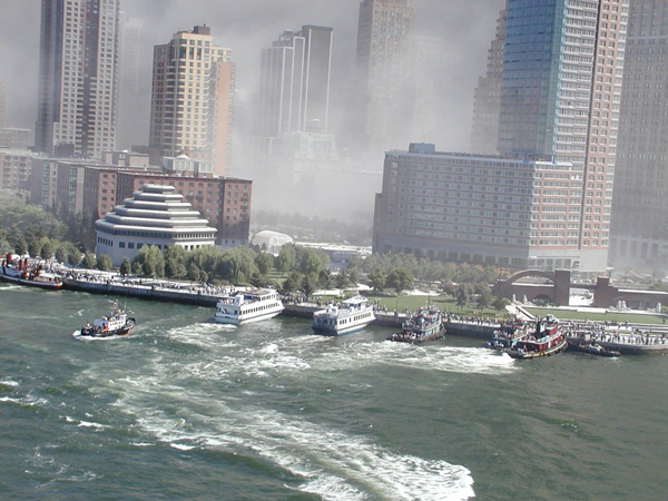 NYPD Commuter ferries pulled directly up to the Battery Park City esplanade to load up panicked survivors for transport across the Hudson. 