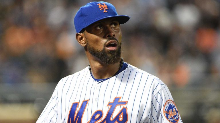 New York Mets third baseman Jose Reyes returns to the dugout after the top of the seventh inning against the Miami Marlins in an MLB baseball game at Citi Field on Tuesday, July 5, 2016.