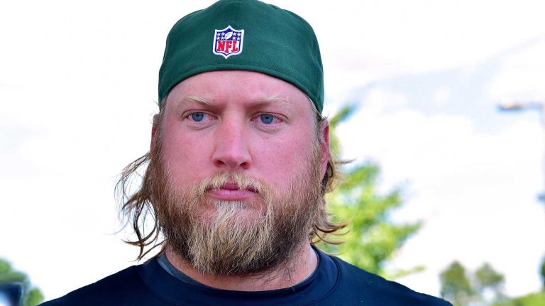 <p>New York Jets center Nick Mangold speaks with the media at Atlantic Health Jets Training Center in Florham Park, New Jersey on Wednesday, July 27, 2016 as players reported for the first day of training camp.</p>