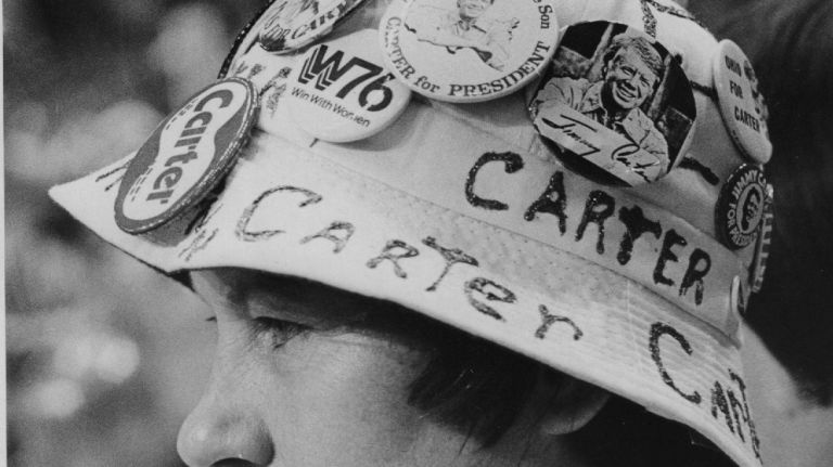 Violet Binni of the Ohio delegation shows her support for Jimmy Carter at the Democratic National Convention in Madison Square Garden on July 14, 1976. 