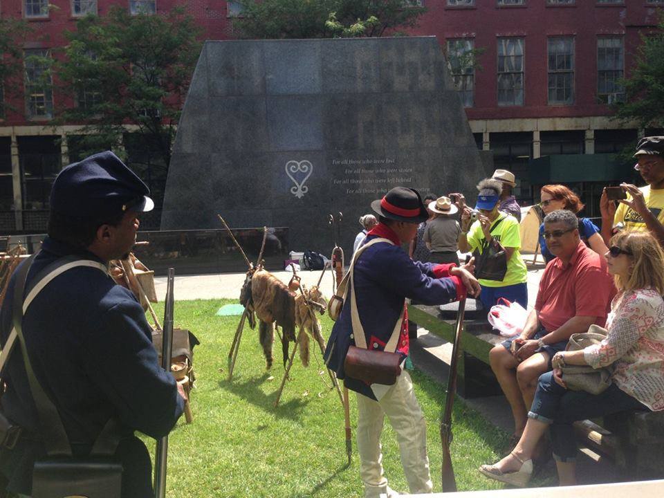 Downtown celebrated its revolutionary history on July Fourth 5 The African of Early New Amsterdam Historical reenactors portraying African-American soldiers from the Revolution to the Civil War conducted educational programs at Downtown's African Burial Ground to mark the official end of slavery in New York State on the Fourth of July in 1827.
