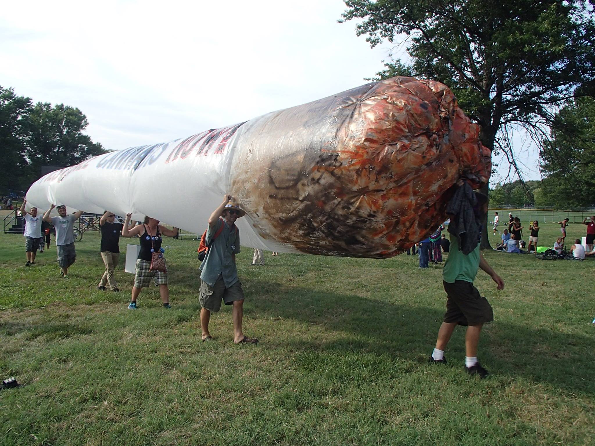 At a marijuana rally, a giant joint was emblazoned with the message, "Hillary, Deschedule Cannabis," as in take it off the government's list of hard and dangerous drugs.