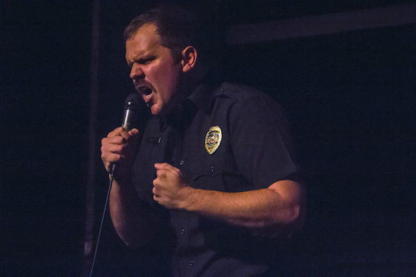 Gunning for FringeNYC 3 George McAuliffe as Officer Scott Baker, in the solo show “Not All Cops Are Bad.” Photo by Ryan Coil.