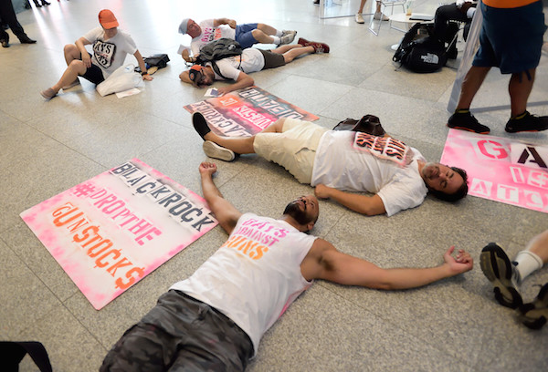 LGBT Anti-Gun Activists Target Asset Manager BlackRock 4 Some protestors lay down in the lobby of BlackRock’s headquarters on E. 52nd St. Photo by Donna Aceto.