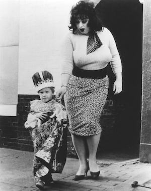 Michael Renner Jr., as the Infant of Prague, guides Divine, as Lady Divine, to a Catholic church — where a life-changing epiphany (and a rosary job) awaits. Photo by Lawrence Irvine.