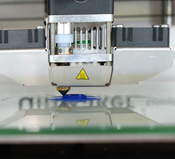 Tech enthusiasts find a home at Fat Cat Fab Lab 1 The wide, blue base stabilizes the object as it comes into shape, and can be cut off after printing. Photo by Tequila Minsky.
