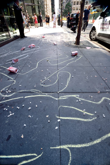 Chalk outlines outside BlackRock’s building representing the Aurora, Colorado, shooting victims. | DONNA ACETO 