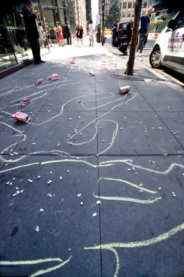 Anti-Gun Activists Target Asset Manager BlackRock 2 Chalk outlines outside BlackRock’s building representing the Aurora, Colorado, shooting victims. | DONNA ACETO