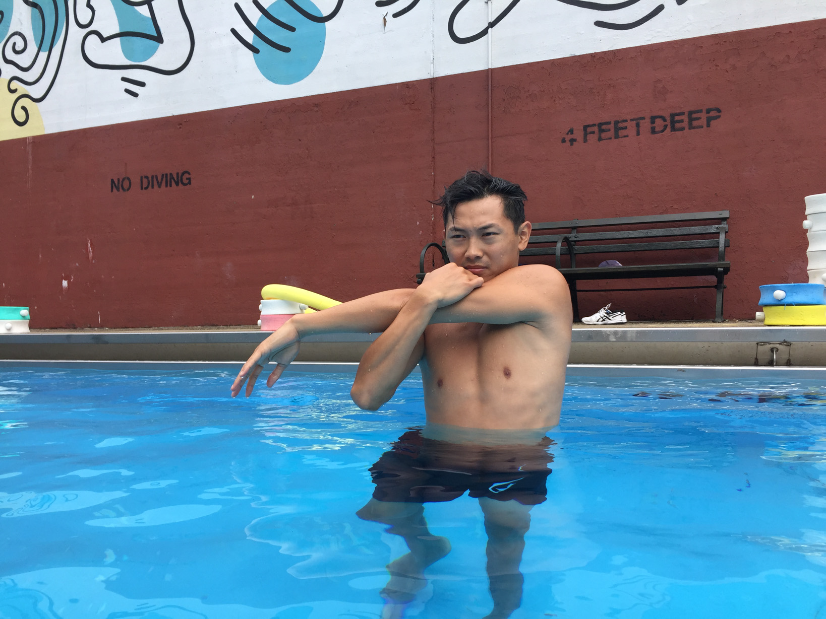 Huang frequently jumps in the water to show proper technique.