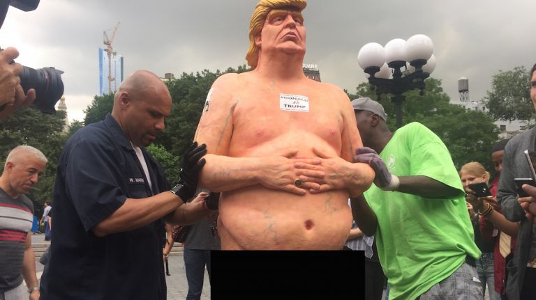 Naked Trump statue in Union Square draws crowds 2 A Donald Trump statue, placed on the 14th Street side of Union Square, depicted the Republican presidential candidate in the nude. It was among five statues that appeared in major U.S. cities on Thursday, Aug. 18, 2016.