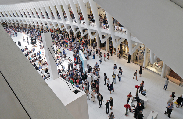 Photo by Milo Hess The double-decker mall inside the Oculus transit hub — originally slated to debut in the spring — finally opened to thousands of eager shoppers on Aug. 16