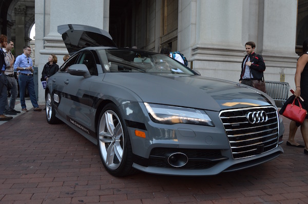 Audi's prototype driverless car sparked curiosity and some people took some stationary test drives. | JACKSON CHEN
