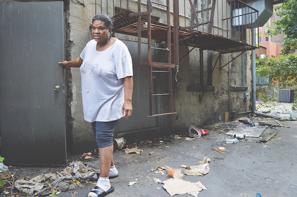 Sandra Johnson in the backyard of her apartment building. | JACKSON CHEN 