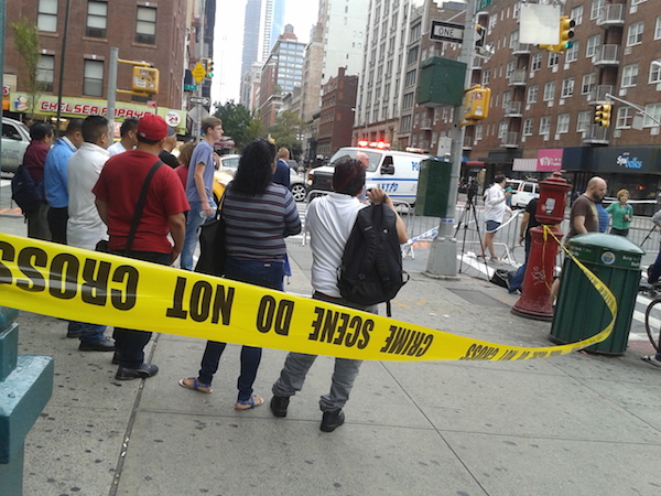 After ‘Craven’ Bombing, Anger and Resolve in Chelsea 6 Onlookers at the corner of Seventh Ave. & W. 23rd St. on the morning of Sun., Sept. 18 — as close as they could get to the block btw. Sixth & Seventh Aves., where an explosion occurred the previous night. Photo by Scott Stiffler.