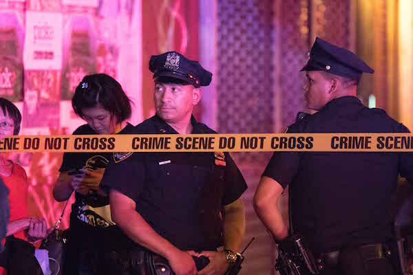 The NYPD set up a protective perimeter almost immediately following Saturday night’s explosion on W. 23rd St. Photo by Daniel Kwak. 