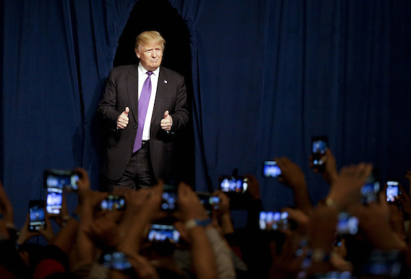 Pop quiz: Who’s got two thumbs and little else in his favor? AP Photo by Jae C. Hong.