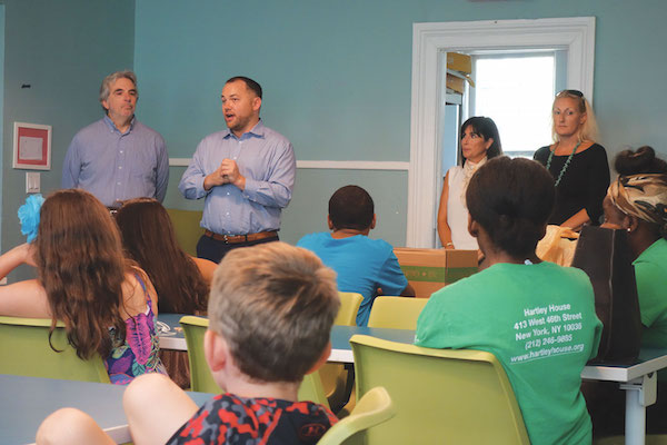 Hells Kitchen Kids’ Gestures of Gratitude Bound for Canadian Town 3 Councilmember Corey Johnson, second from left, speaks to Hartley House summer camp children. Courtesy Office of Councilmember Corey Johnson.