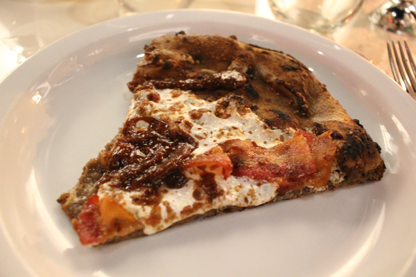 Lust for the crust: Soho eatery's romantic new pizzas 1 Photo by Yeonji Wu The savory “Giacomo” is salty-sweet, topped with a combination of fig puree, bacon, Gorgonzola, caramelized onions, and Adoro Lei’s milky, house-made mozzarella.