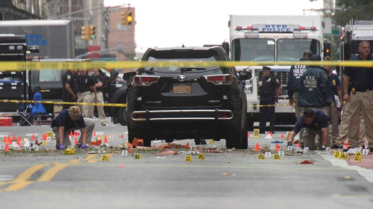 Chelsea explosion injures multiple people in Manhattan: See photos from the scene 12 The NYPD conducts an investigation at the scene of an explosion in Chelsea on Sept. 18, 2016.