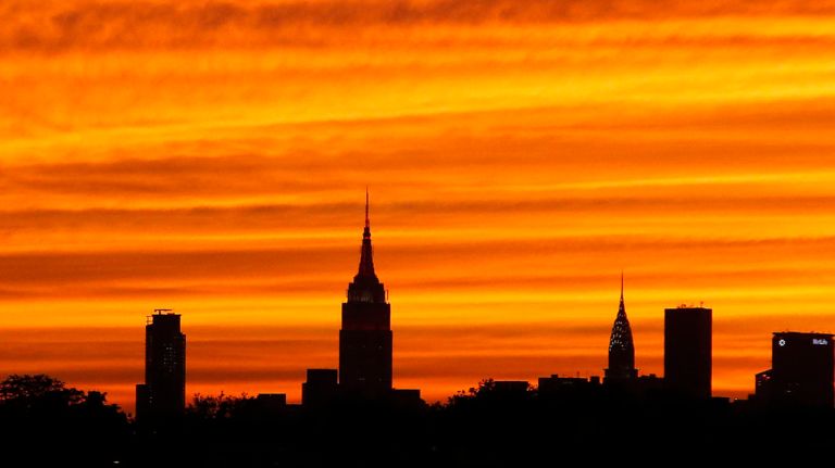 The skyline of New York City is seen from Citi Field as the sun sets prior to a game between the New York Mets and the Atlanta Braves on Wednesday, Sep. 21, 2016 in the Queens Borough of New York City. 


