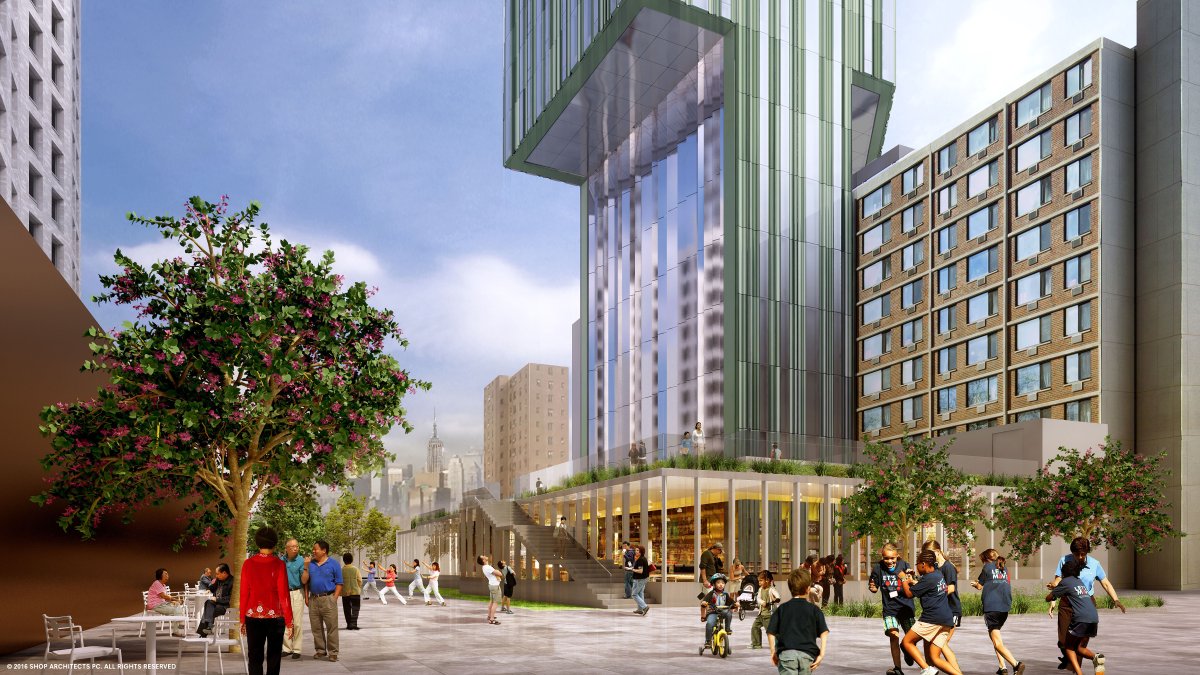 A design rendering showing how the proposed 247 Cherry St. project would loom over an existing senior housing building, at right. Money from the sale of air rights for the high-rise tower would be used for improvements on the exisiting senior housing.