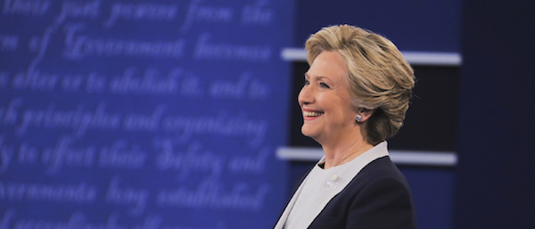 Hillary Clinton smiles, knowing the presidency is her get out of jail free card. Photo via hillaryclinton.com.