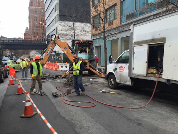 A photo from September shows the sidewalk closed on both sides of the street. Photo courtesy Mike Weiss Gallery.