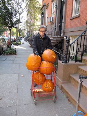 Volunteers have carts, will travel — to liberate you from your Halloween pumpkins, then humanely deliver them to a better place. Photo by Pat Cooke.