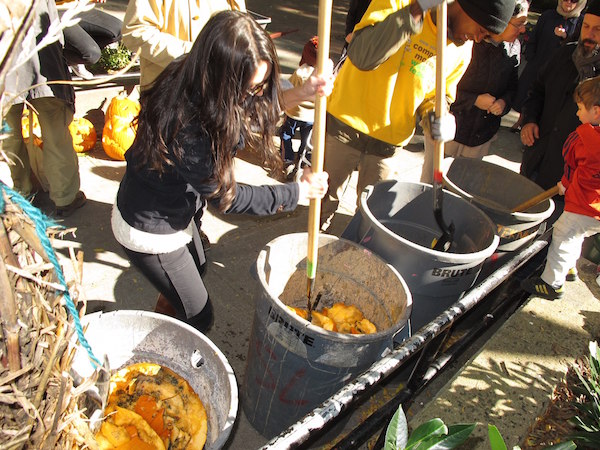 Unwanted pumpkins become the seeds of things to come, at Nov. 5’s composting event. Photo by Dorothy Francoeur.