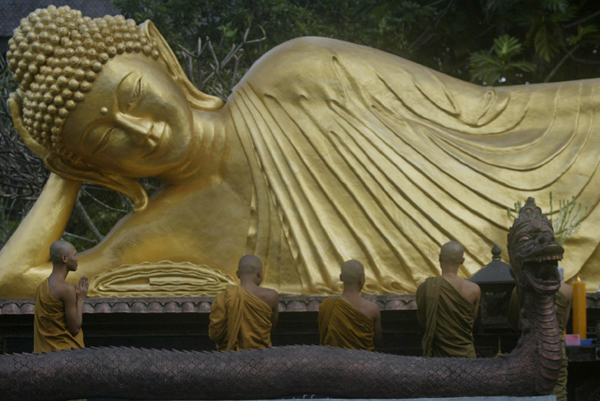 Associated Press Unlike this reclining Buddha statue in Indonesia, Tribeca residents didn't take the prospect of a Buddha Bar franchise on their street lying down, but the state approved it anyway.