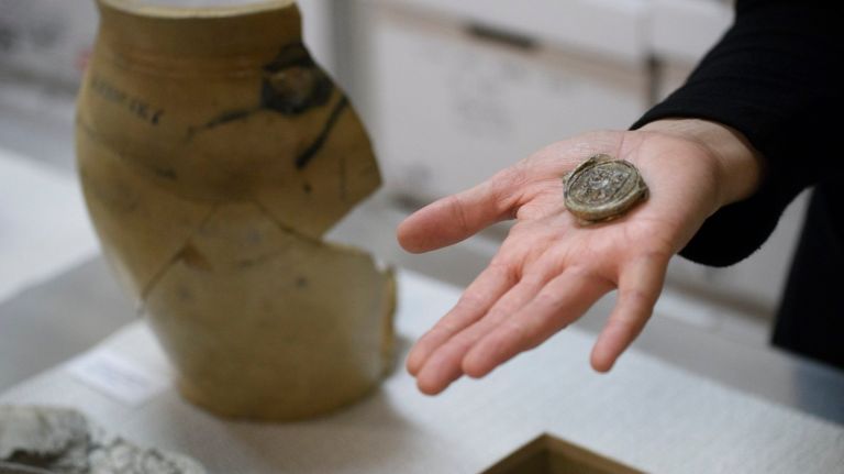 Among the historical items on display at the New York City Archaeological Repository: Nan A. Rothschild Research Center is this wine bottle seal with the armorial seal of New York Colonial Governor Benjamin Fletcher, found in South Ferry, Manhattan and dating from the late 17th century.