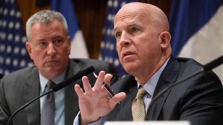 New York City Mayor Bill de Blasio, left, and New York Police Department Commissioner James O'Neill, right, attend a news conference regarding crime statistics at One Police Plaza in Manhattan on Monday, Oct. 3, 2016.