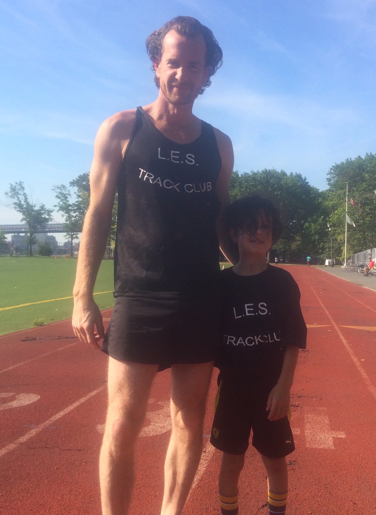 Paul Pendelton and his son at the East River Park running track at E. Sixth St.