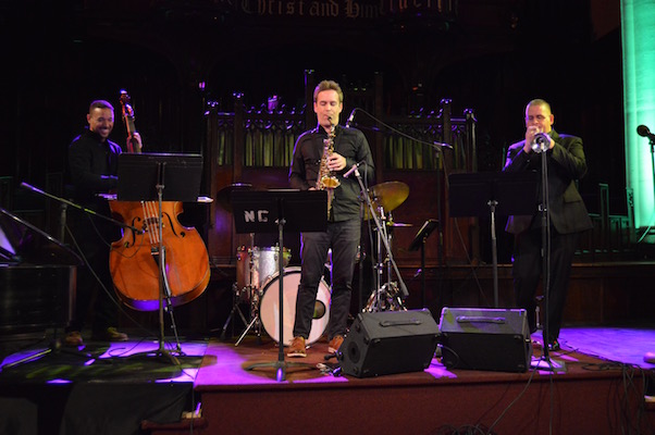 Saxophonist Daniel Bennett plays with Kevin Farrell on bass and Brandon Vazquez on trumpet. | BY JACKSON CHEN 